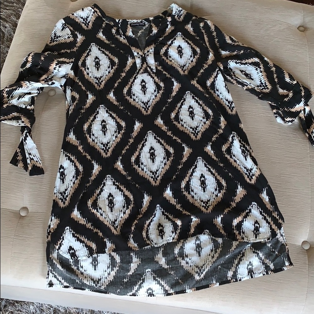 High low tunic top. Size 1x. NWOT